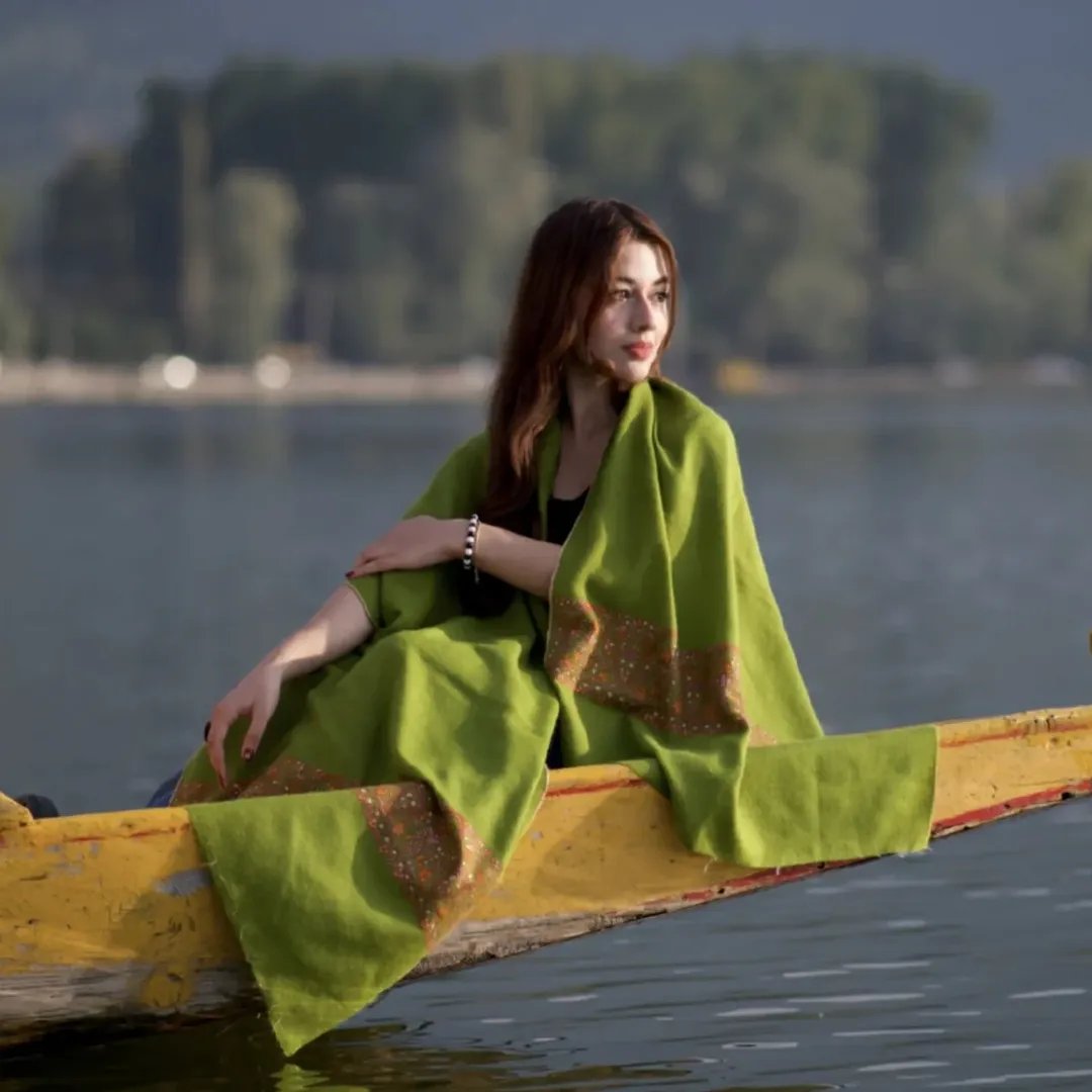 White ethnic wear on a Kashmir lake boat
