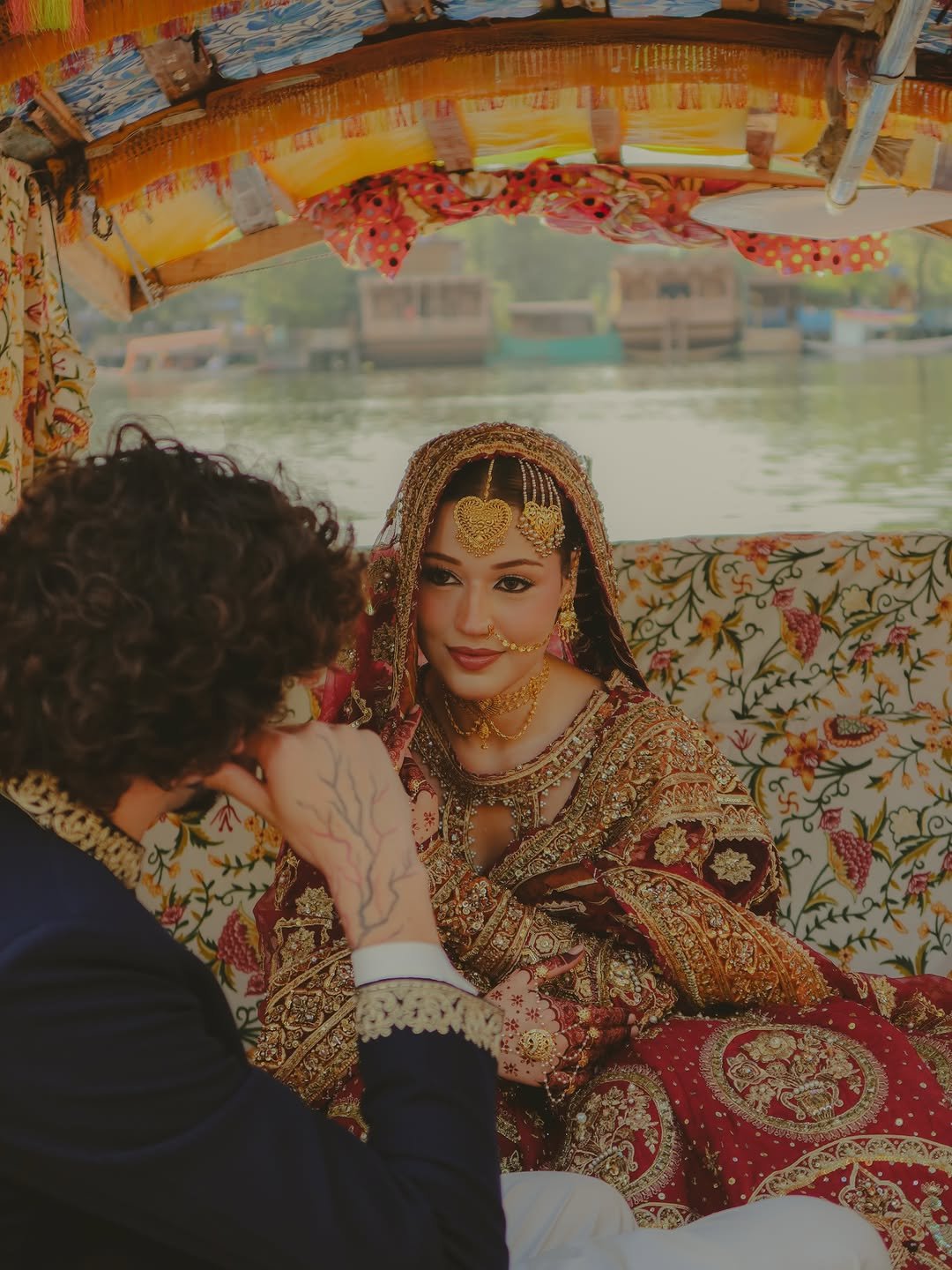 Marsha Ajaz in a bridal editorial on a Dal Lake houseboat