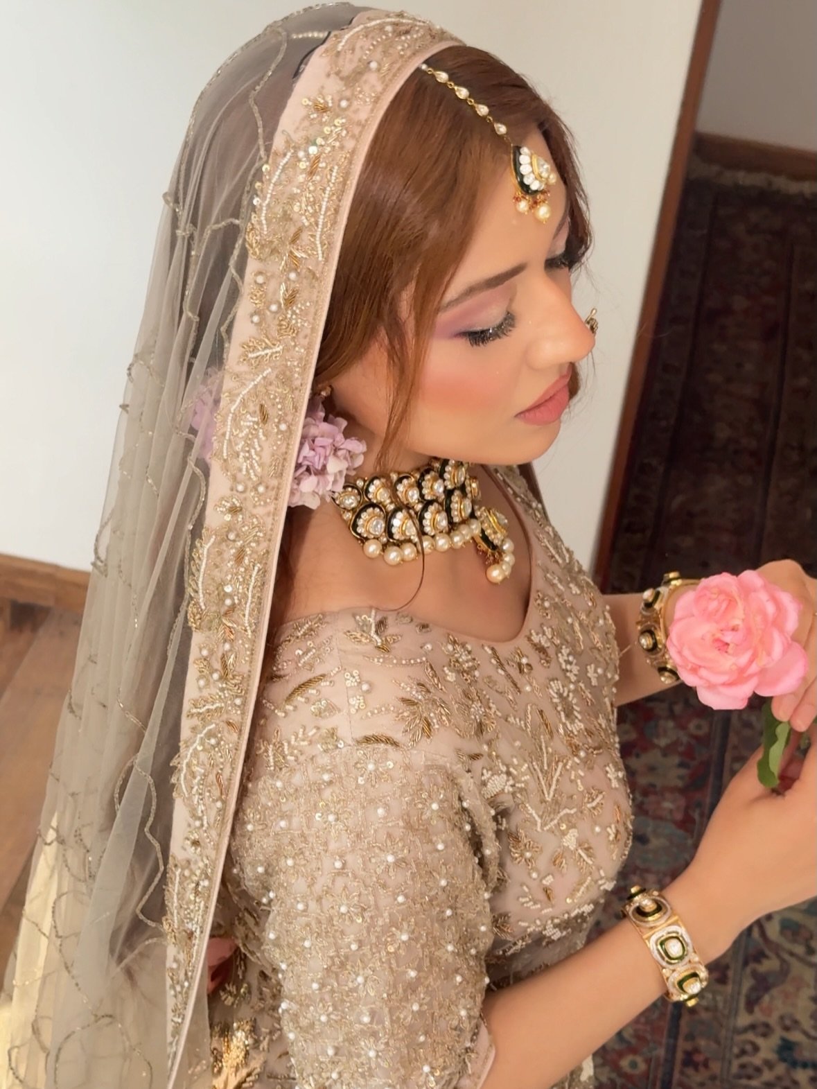 Marsha Ajaz portrait in blush bridal wear